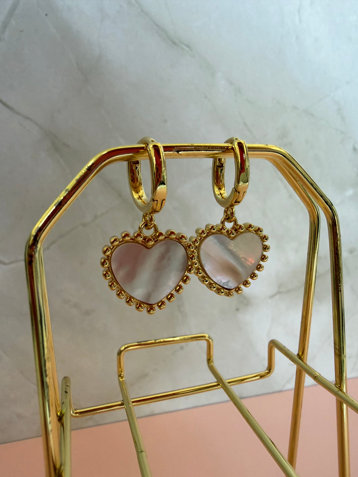 Pendientes dorados variados