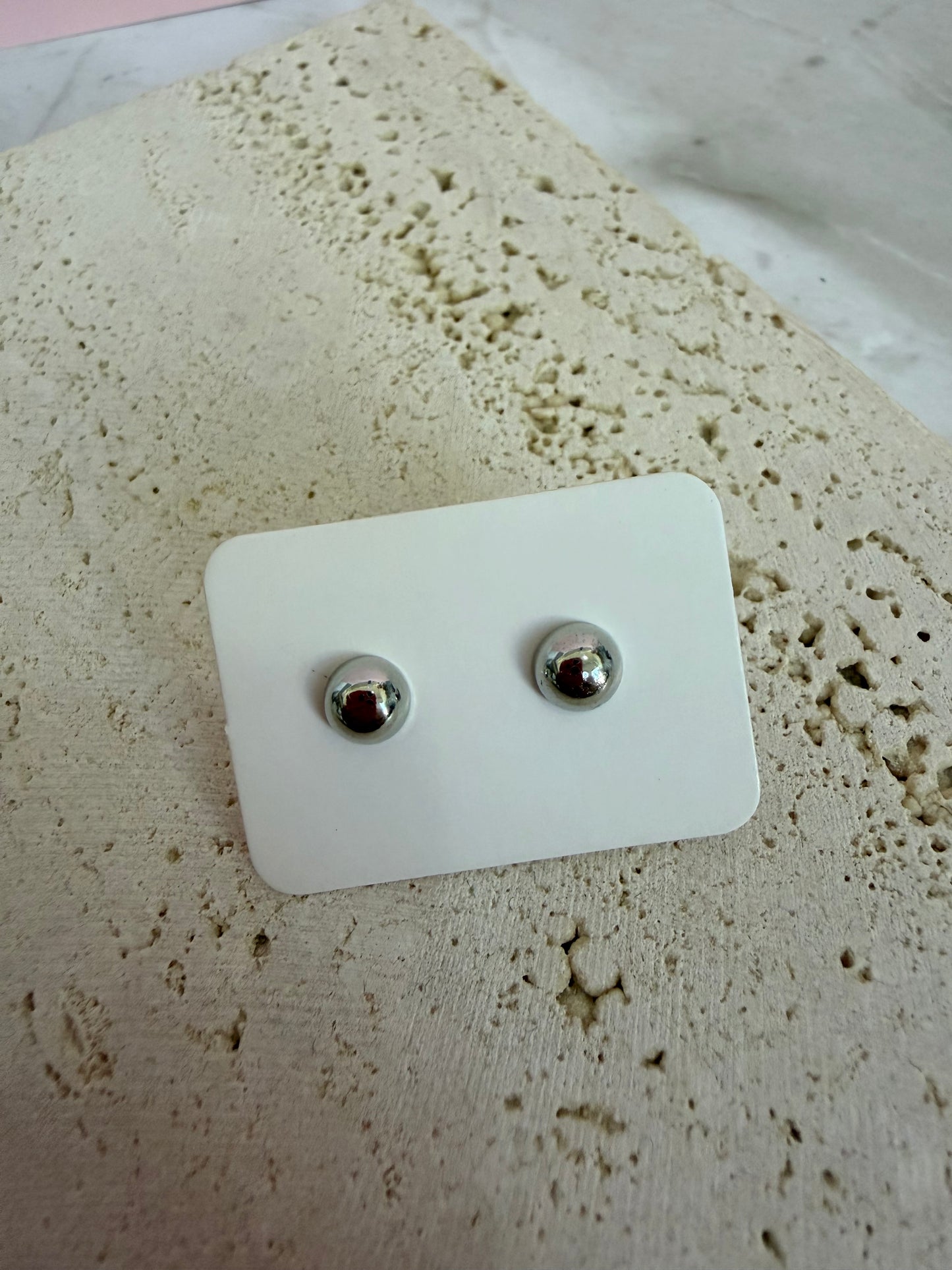Pendientes plateados variados